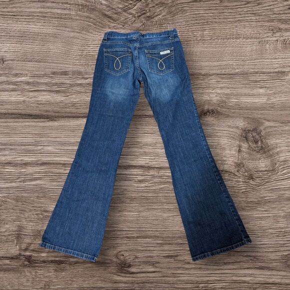 Calvin Klein Regular Wash Low Rise Flare Jeans - Picture 2 of 6